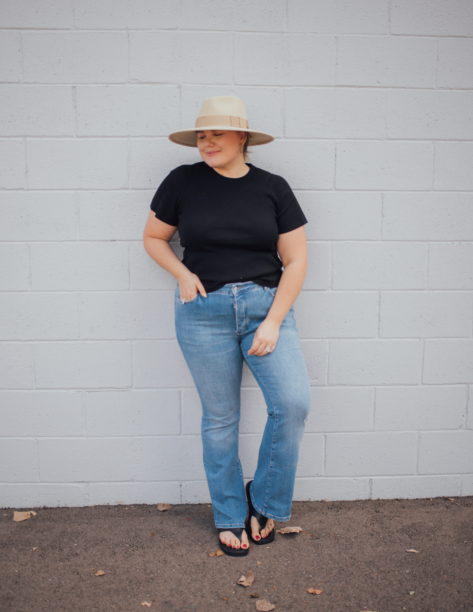 Sharing a simple chic plus size flare denim outfit that works well for casual days out! The more you wear wide leg jeans the easier it gets!