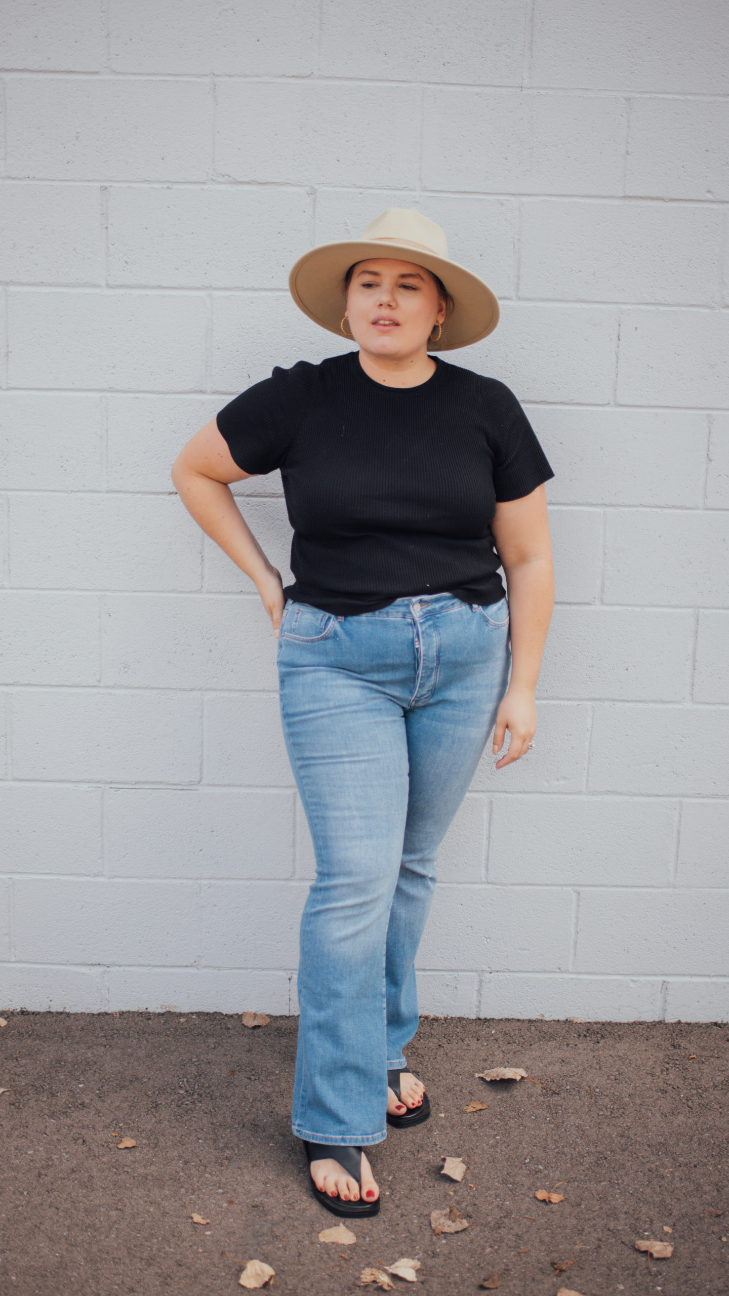 Sharing a simple chic plus size flare denim outfit that works well for casual days out! The more you wear wide leg jeans the easier it gets!