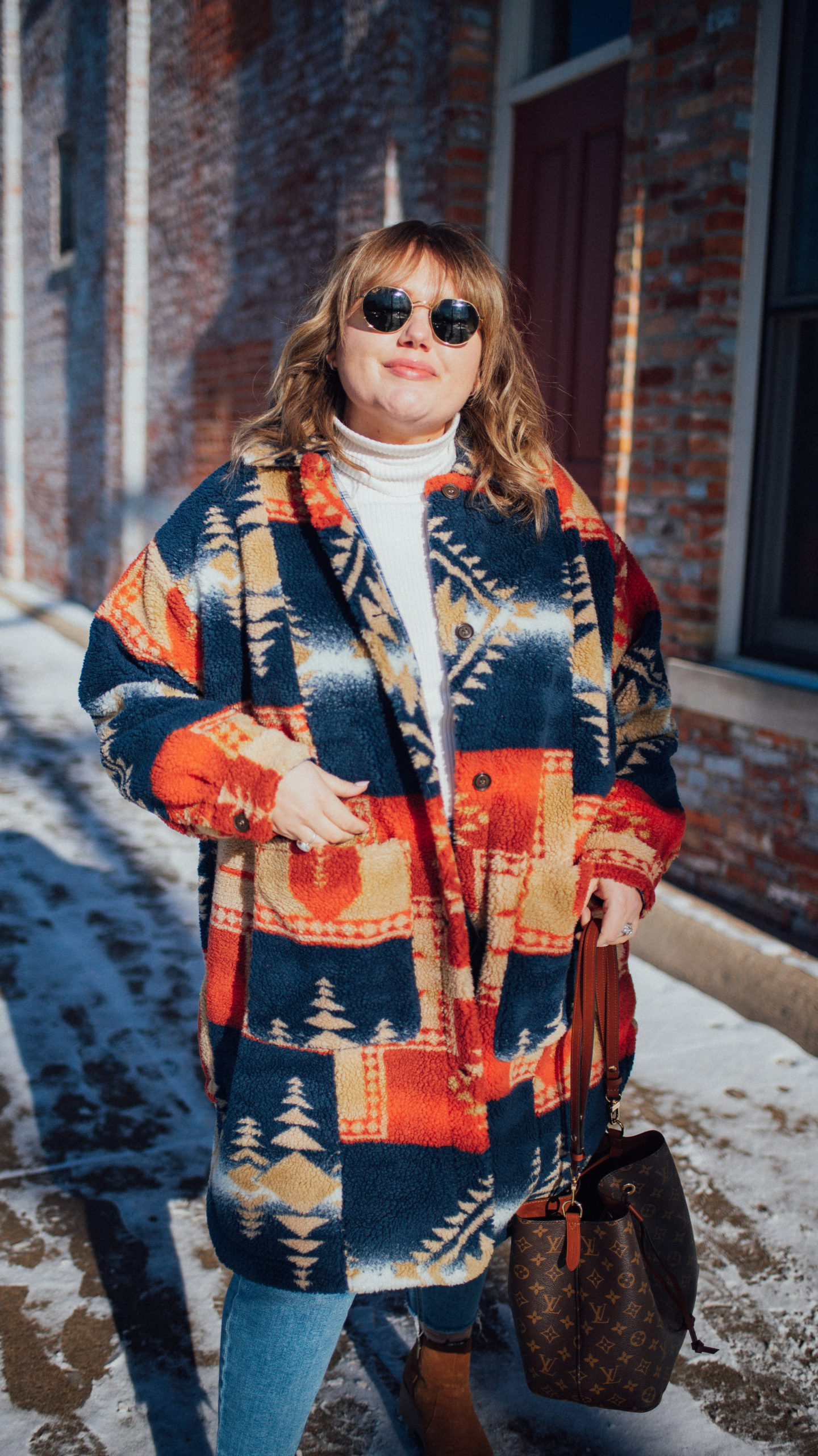 Sharing a cozy  sherpa outfit for the coldest of winter days! Staying warm and looking cute in plus size winter items from Anthropologie!