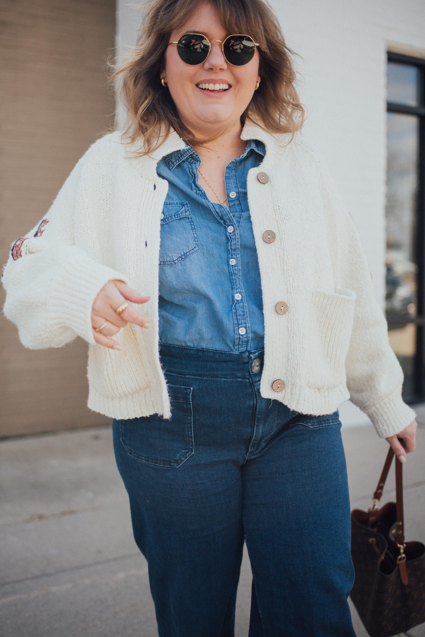 Sharing a plus size equestrian sweater look that is warm and fun for spring! I love the way this outfit wears and the boho vibe! 