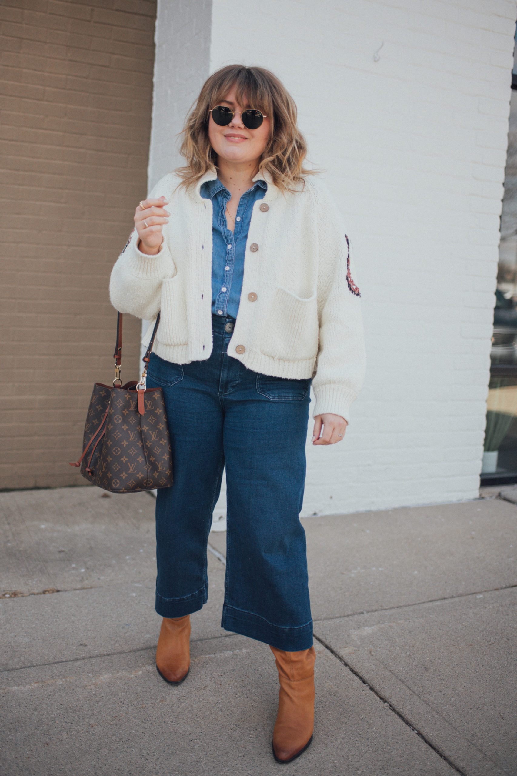Sharing a plus size equestrian sweater look that is warm and fun for spring! I love the way this outfit wears and the boho vibe! 