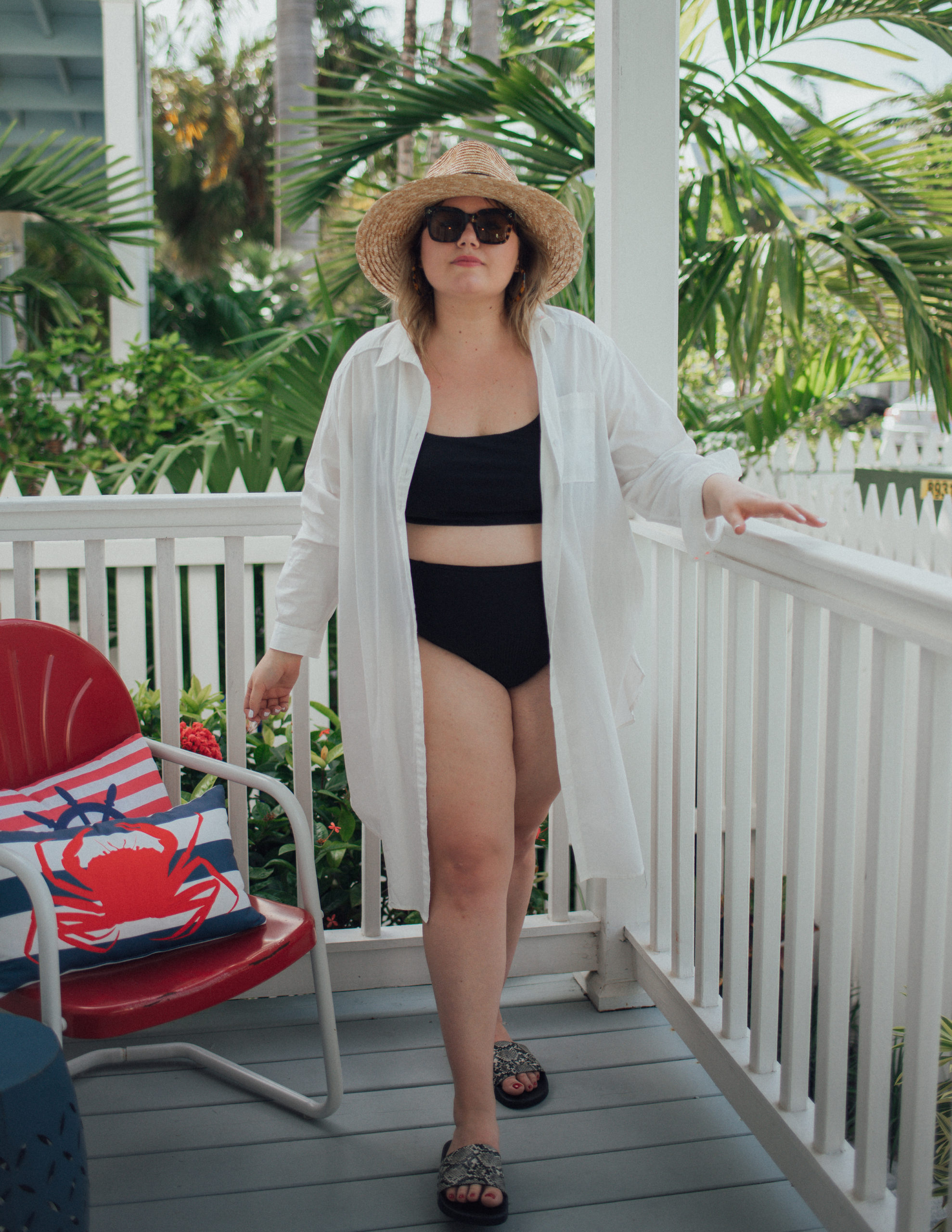 Sharing a chic plus size swim look and all the pieces to recreate it! A black bikini, white swim cover and snake sandals! 