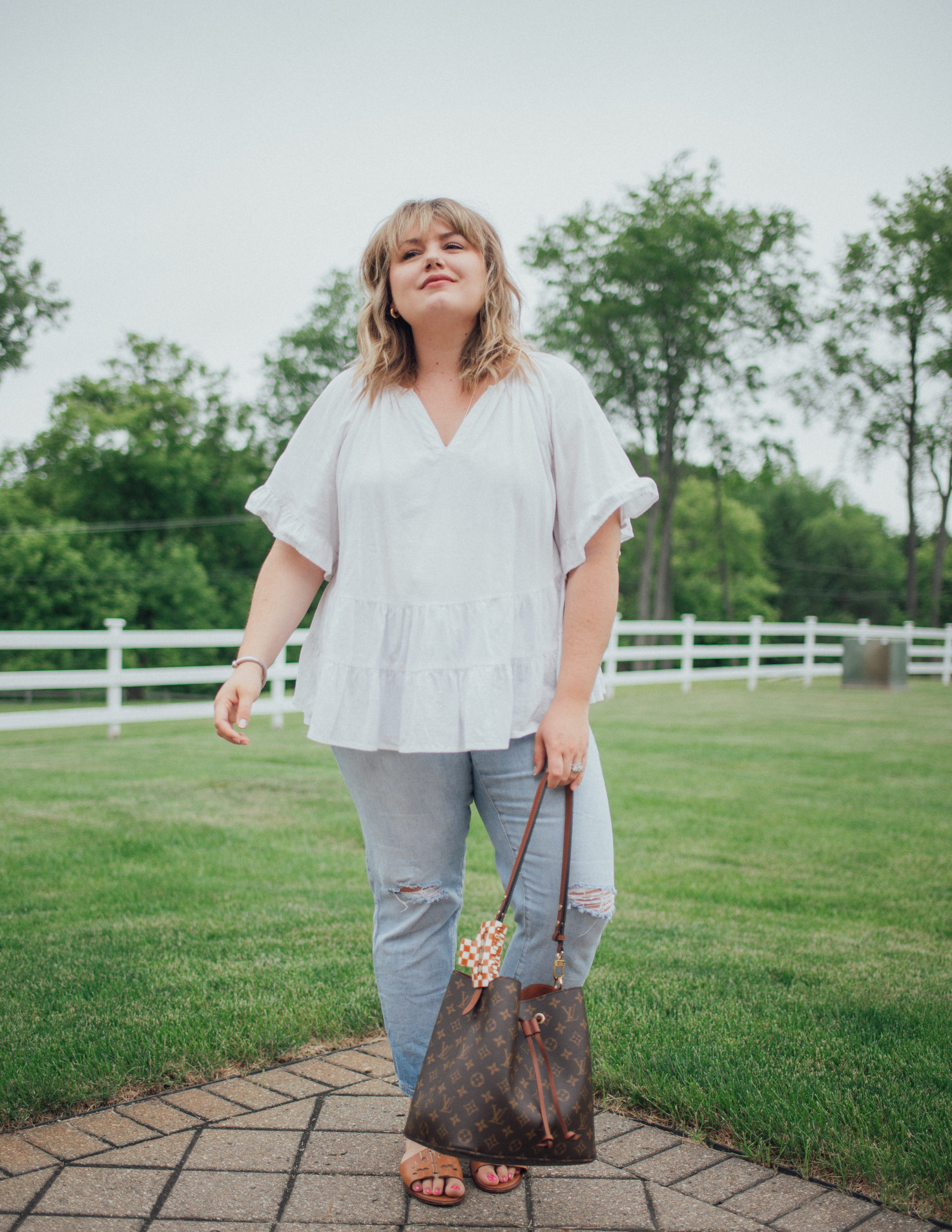 Sharing a roundup of plus size boho tops for summer from different brands. A boho top is flowy, light and looks great with jeans! 